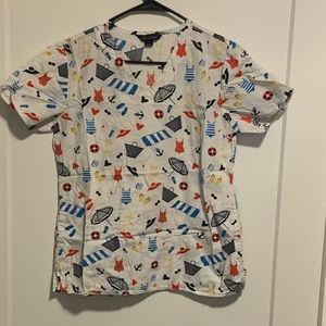 Summer/nautical print scrub top size S